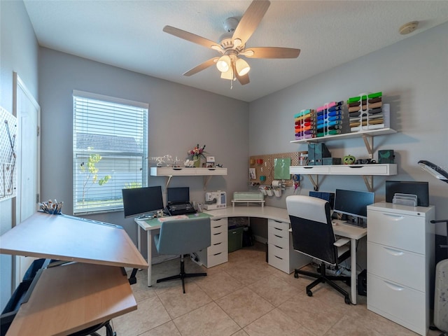 office area featuring light tile patterned floors and ceiling fan