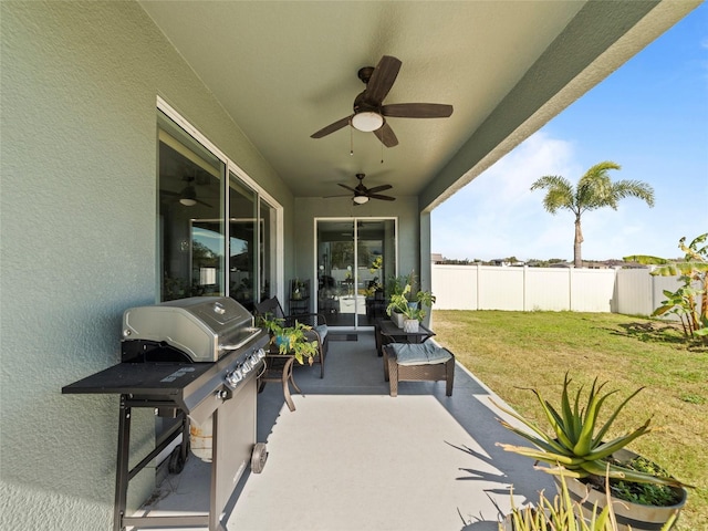 view of patio / terrace featuring ceiling fan