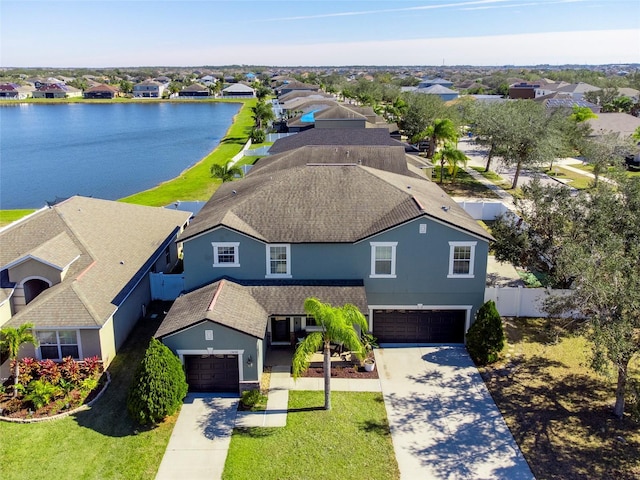 drone / aerial view with a water view