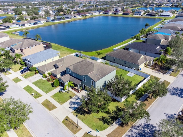 drone / aerial view with a water view