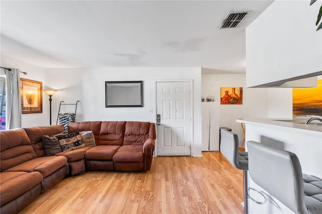 1400 Gandy Blvd N Unit 506, Saint Petersburg, FL 33702 - living room with light hardwood / wood-style flooring