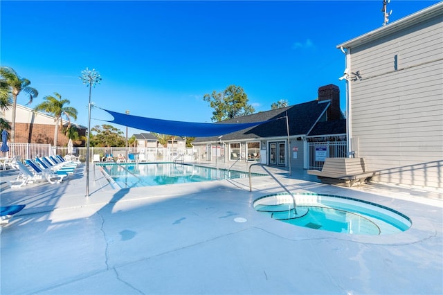1400 Gandy Blvd N Unit 506, Saint Petersburg, FL 33702 - view of swimming pool featuring a hot tub and a patio