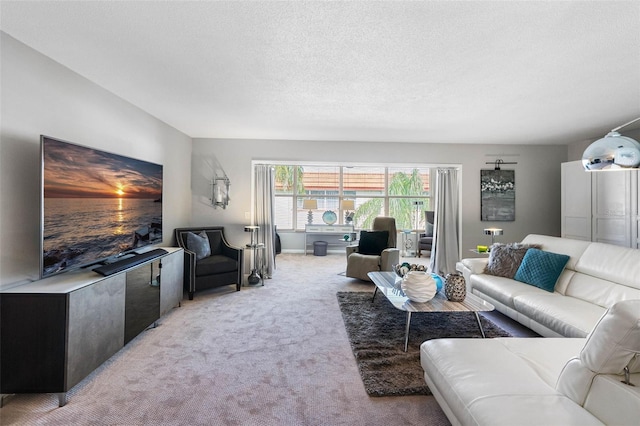 living room with light carpet and a textured ceiling