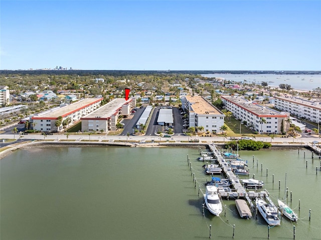 drone / aerial view with a water view and a city view