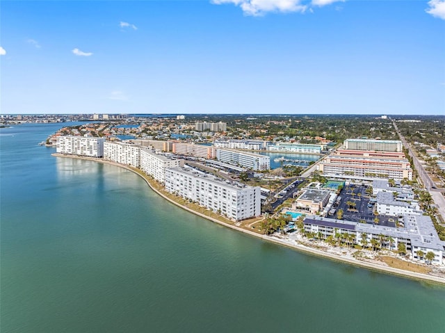 drone / aerial view featuring a view of city and a water view