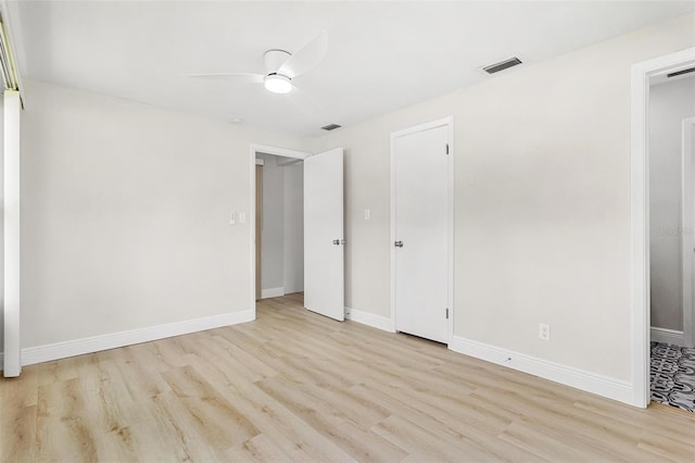 unfurnished bedroom featuring ceiling fan and light hardwood / wood-style floors