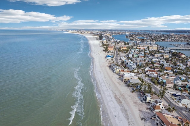 aerial view with a water view and a beach view