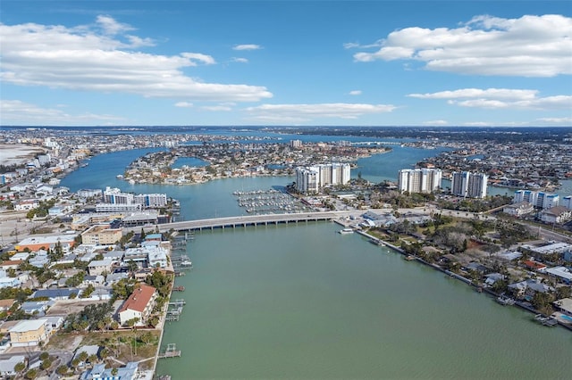 drone / aerial view featuring a water view and a city view