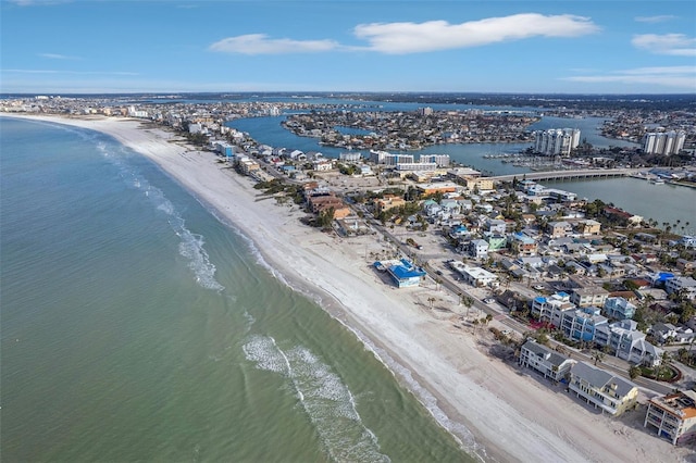 aerial view with a beach view, a water view, and a city view