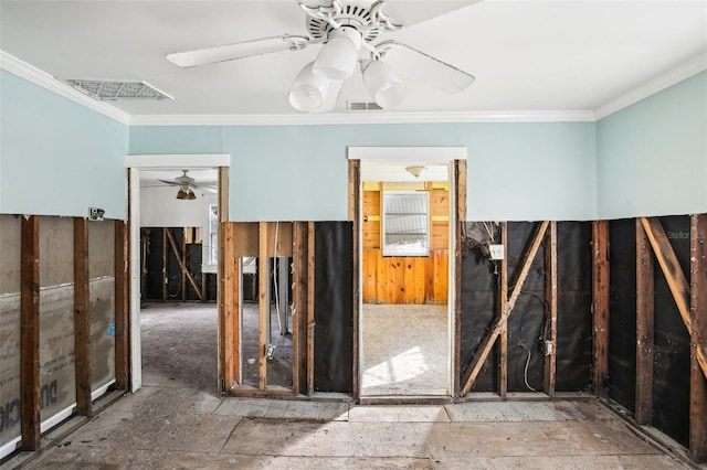 misc room featuring a ceiling fan, visible vents, and crown molding