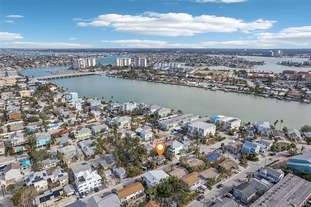 bird's eye view featuring a water view and a city view