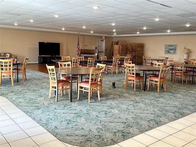 5400 Park St N Unit 209, Saint Petersburg, FL 33709 - tiled dining room featuring carpet flooring and recessed lighting