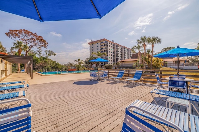 5400 Park St N Unit 209, Saint Petersburg, FL 33709 - wooden deck with a community pool
