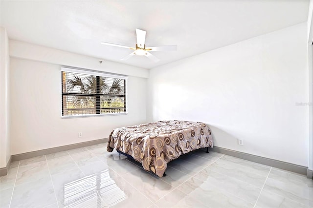 5400 Park St N Unit 209, Saint Petersburg, FL 33709 - bedroom with baseboards and a ceiling fan