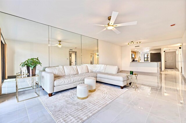 5400 Park St N Unit 209, Saint Petersburg, FL 33709 - living area with ceiling fan