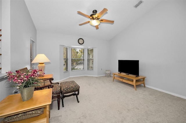 sitting room featuring lofted ceiling, carpet floors, and ceiling fan