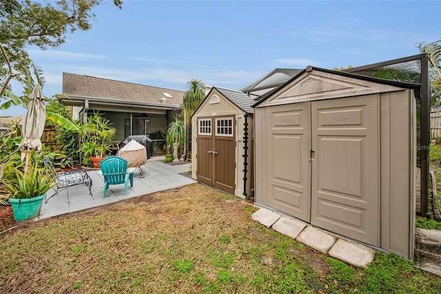 view of outdoor structure with a lawn