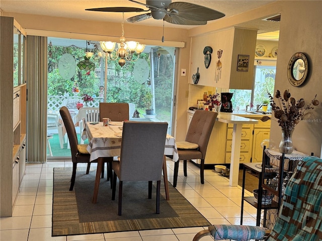 dining area featuring light tile patterned flooring and a wealth of natural light