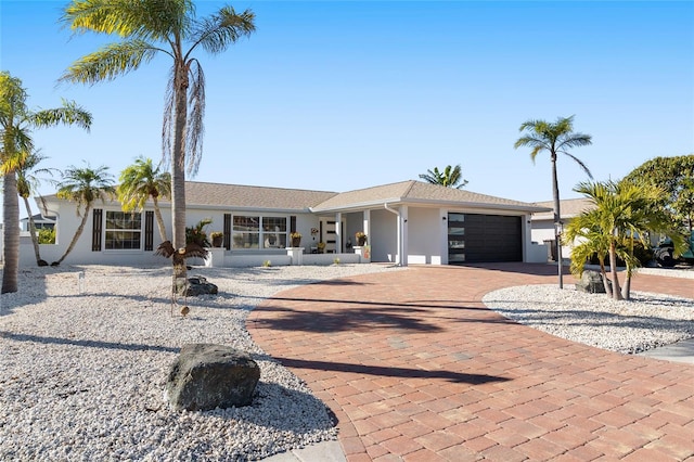 ranch-style house with a garage