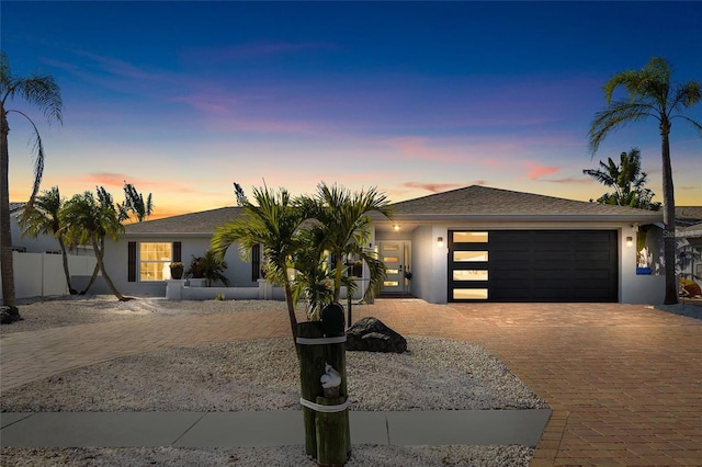 view of front of home featuring a garage