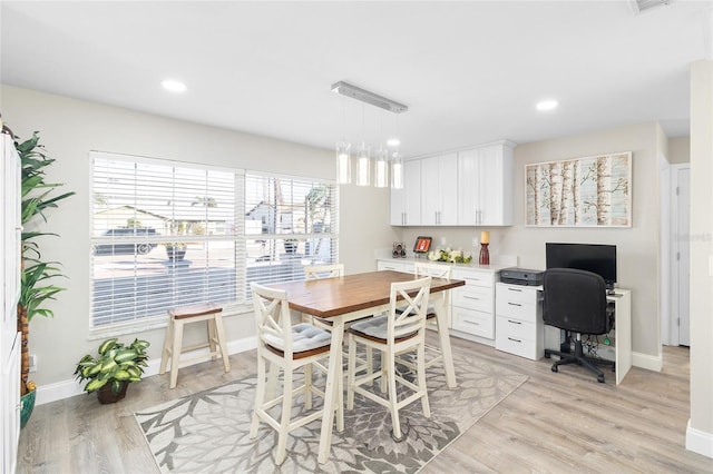 dining area featuring light hardwood / wood-style floors