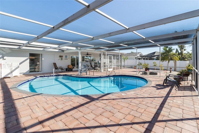 view of pool featuring a lanai and a patio area