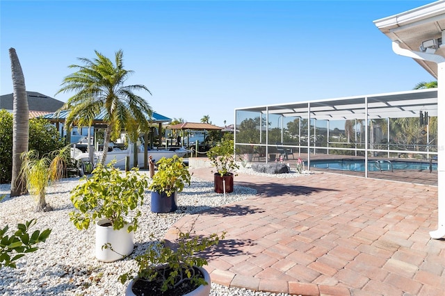 view of patio / terrace with glass enclosure