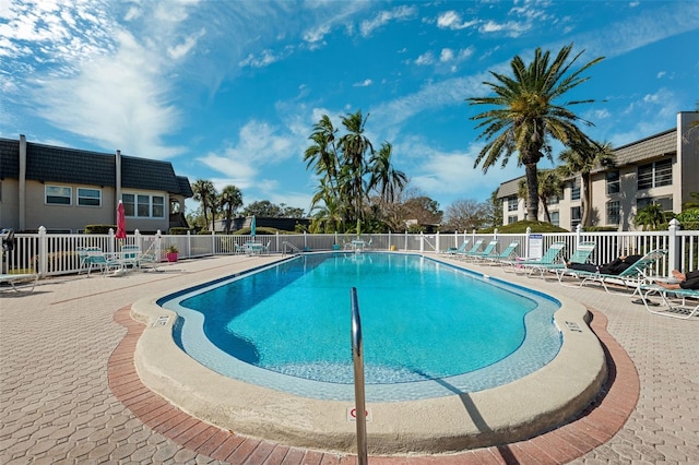 view of pool featuring a patio area