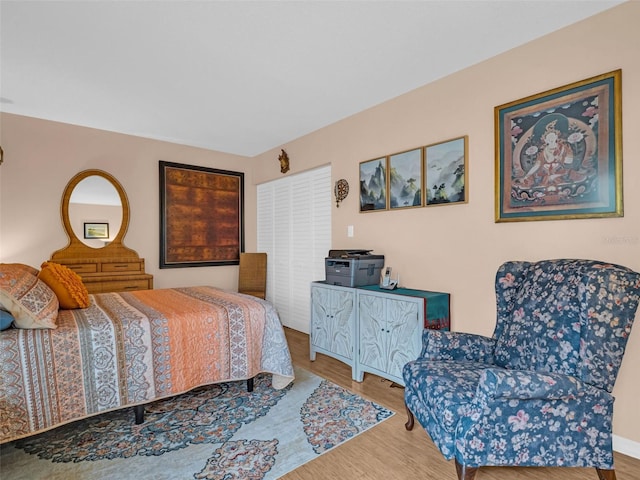 bedroom with wood finished floors