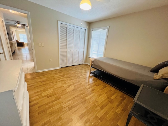 bedroom featuring a closet and light hardwood / wood-style flooring