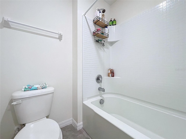 bathroom featuring toilet and washtub / shower combination