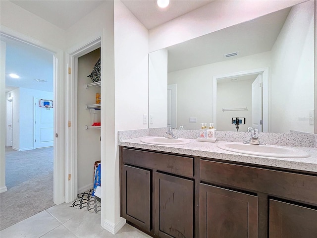 bathroom featuring vanity and tile patterned floors