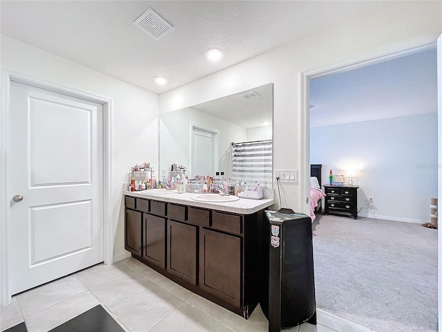 bathroom featuring a shower with curtain and vanity