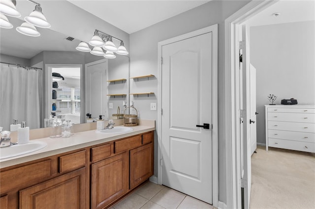 bathroom featuring vanity and tile patterned floors