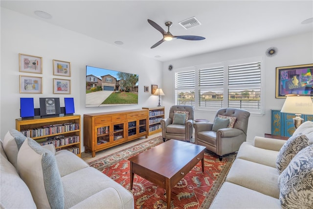 living room with ceiling fan