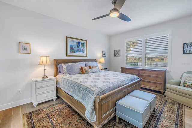 bedroom featuring ceiling fan and light wood-type flooring