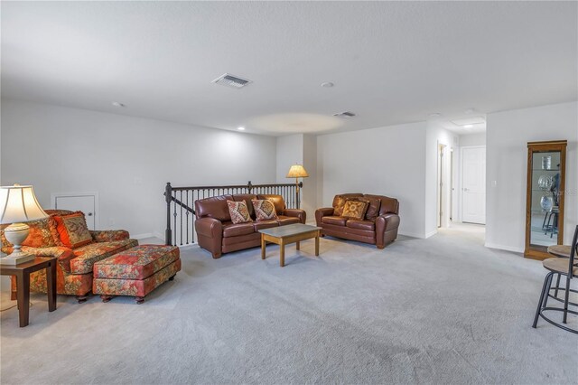 living room featuring light colored carpet