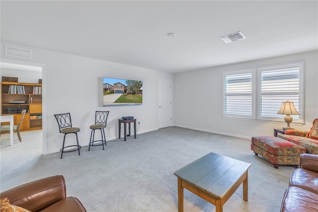 living room with light colored carpet