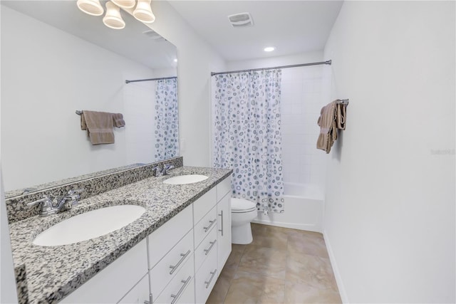 full bathroom featuring vanity, tile patterned flooring, toilet, and shower / bath combo with shower curtain