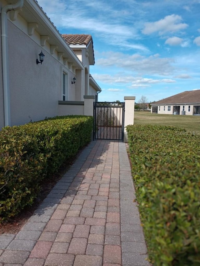 view of home's exterior with a yard