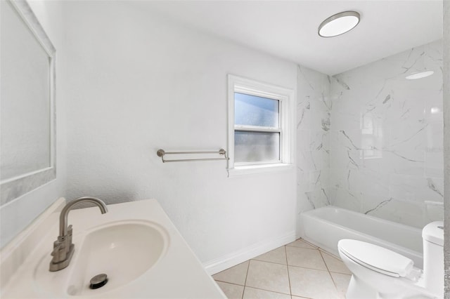 full bathroom with tiled shower / bath combo, vanity, tile patterned floors, and toilet