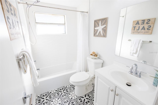 full bathroom with vanity, shower / tub combo, and toilet