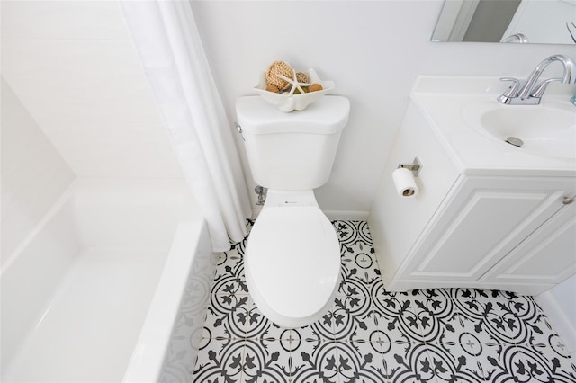 bathroom featuring vanity and toilet