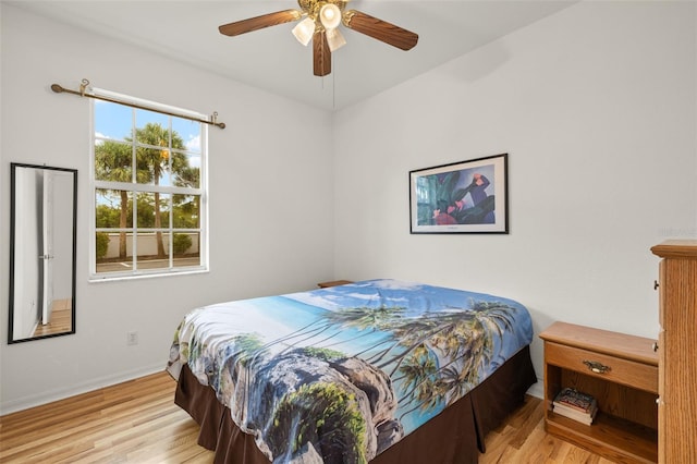 bedroom featuring ceiling fan and light hardwood / wood-style flooring