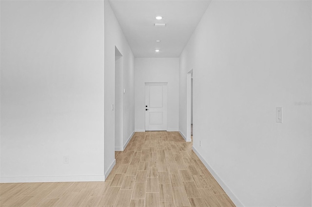 3560 Bellefonte Ave, North Port, FL 34286 - hall with light wood-style floors, baseboards, visible vents, and recessed lighting
