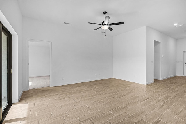3560 Bellefonte Ave, North Port, FL 34286 - empty room with wood tiled floor, visible vents, baseboards, and a ceiling fan