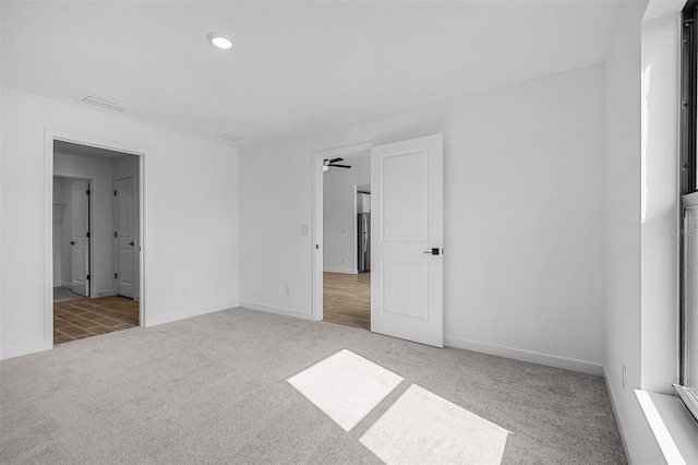 3560 Bellefonte Ave, North Port, FL 34286 - empty room featuring visible vents, baseboards, recessed lighting, a ceiling fan, and carpet floors