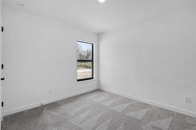 3560 Bellefonte Ave, North Port, FL 34286 - spare room with carpet flooring and baseboards