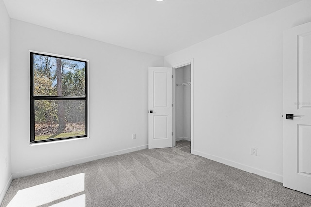 5237 Aberback St, North Port, FL 34291 - unfurnished bedroom with baseboards and carpet