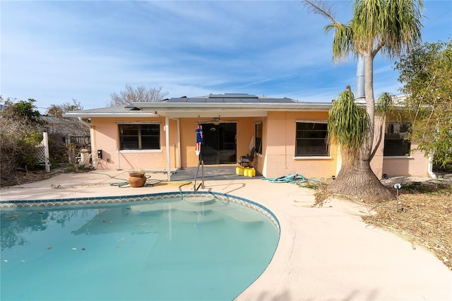 rear view of house featuring a patio